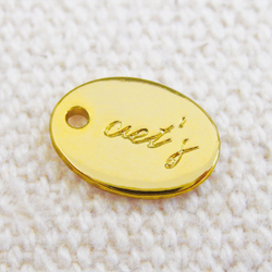 アクセサリープレート　ブランドプレート　Aet's 様　真鍮製／光沢金メッキ／金型刻印