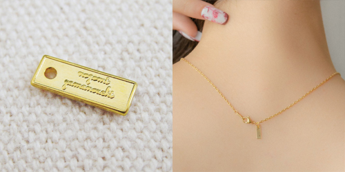 アクセサリープレート　ブランドプレート　atelier nail iro 様　真鍮製／光沢金メッキ／金型刻印