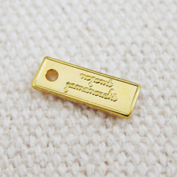 アクセサリープレート　ブランドプレート　atelier nail iro 様　真鍮製／光沢金メッキ／金型刻印