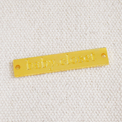 アクセサリープレート　ブランドプレート　baby.closet 様　真鍮製／金メッキ＋磨き／金型刻印