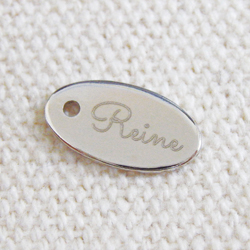 アクセサリープレート　ブランドプレート　リボン教室 Reine 様　真鍮製／光沢銀色メッキ／レーザー刻印