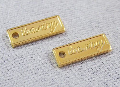 アクセサリープレート　ブランドプレート　too.niny 様　真鍮製／光沢金メッキ／金型刻印