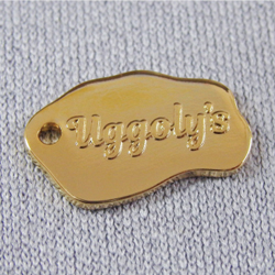 アクセサリープレート　ブランドプレート　Uggoly's 様　真鍮製／光沢金メッキ／金型刻印
